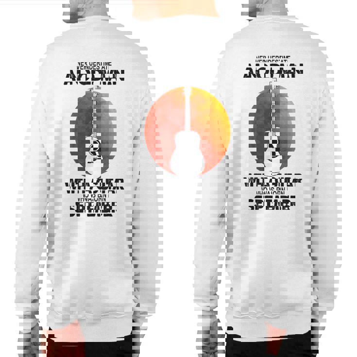 Never Underestimate An Old September Man With A Guitar Sweatshirt Back Print