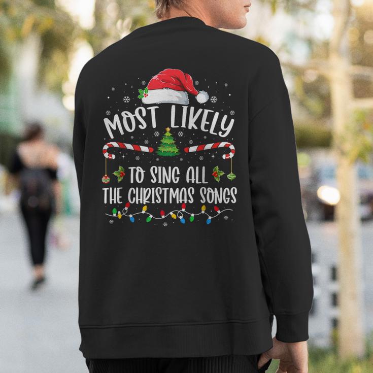 Most Likely To Sing All The Christmas Songs Christmas Sweatshirt Back Print