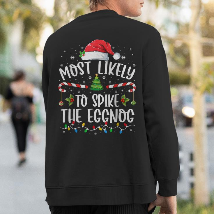 Most Likely To Spike The Eggnog Family Matching Christmas Sweatshirt Back Print