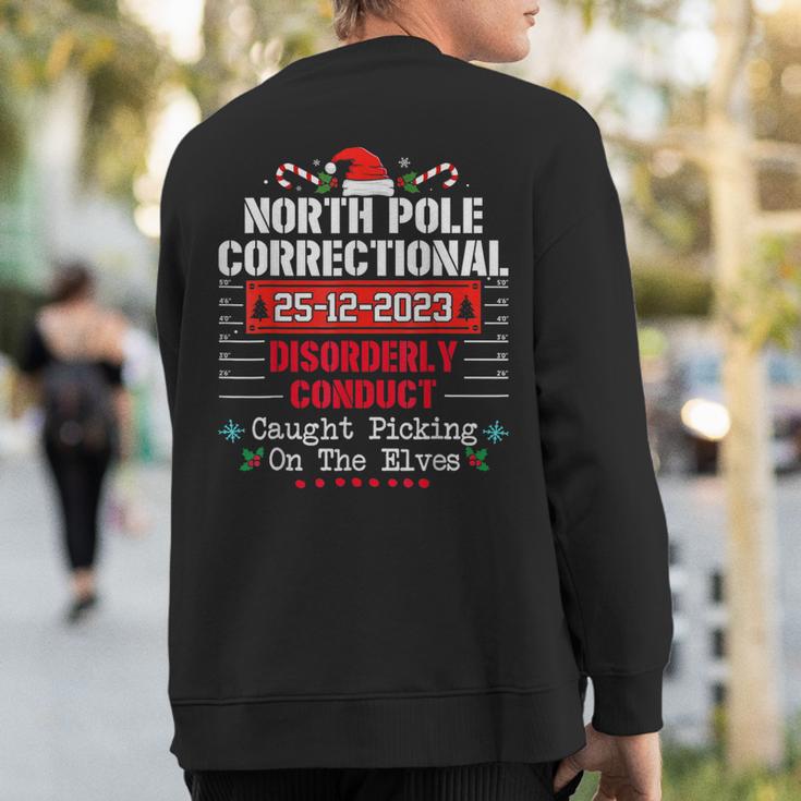 North Pole Correctional Disorderly Conduct Caught Elves Xmas Sweatshirt Back Print