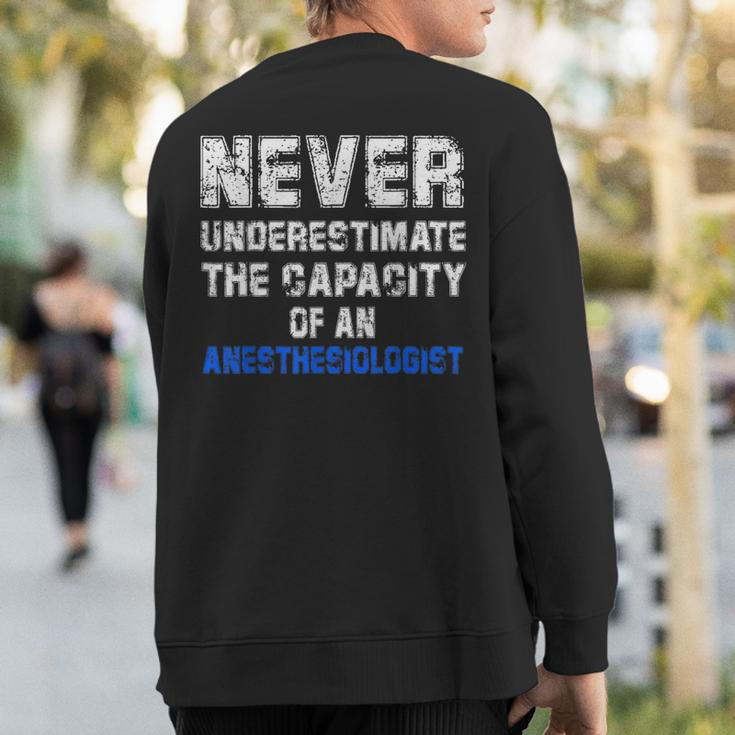 Never Underestimate The Capacity Of An Anesthesiologist Sweatshirt Back Print