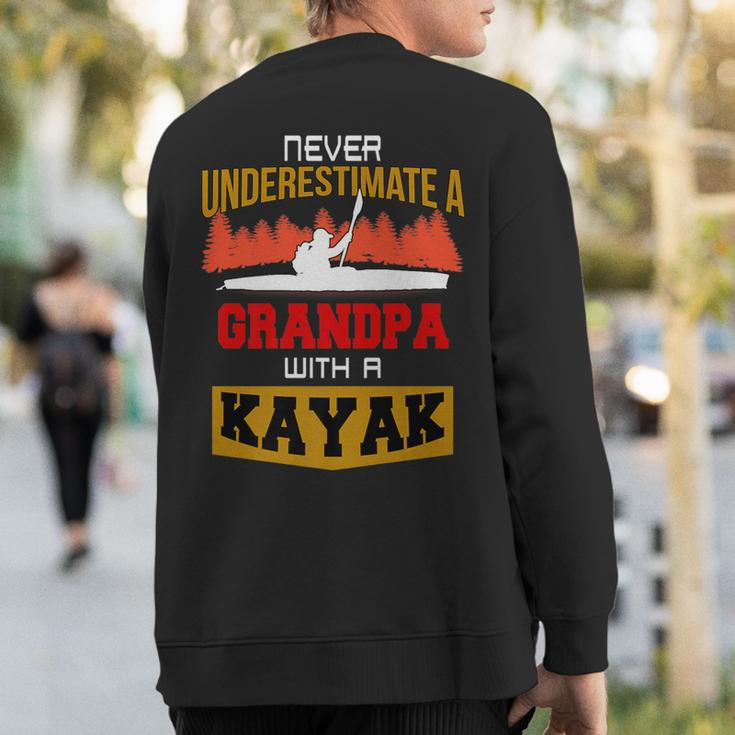Never Underestimate A Grandpa With A Kayak Fun Sweatshirt Back Print
