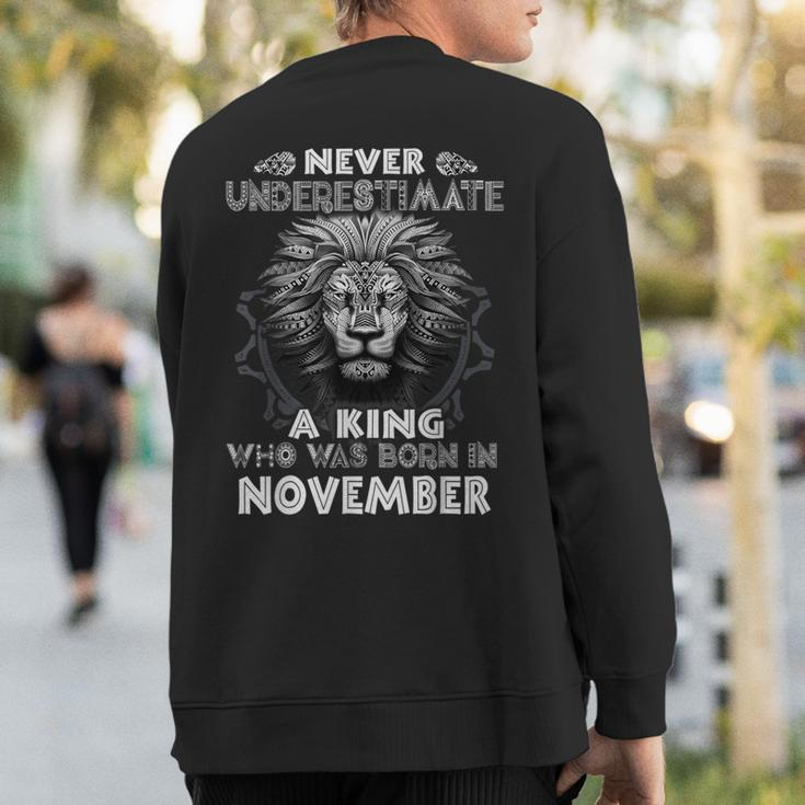 Never Underestimate A King Who Was Born In November Sweatshirt Back Print