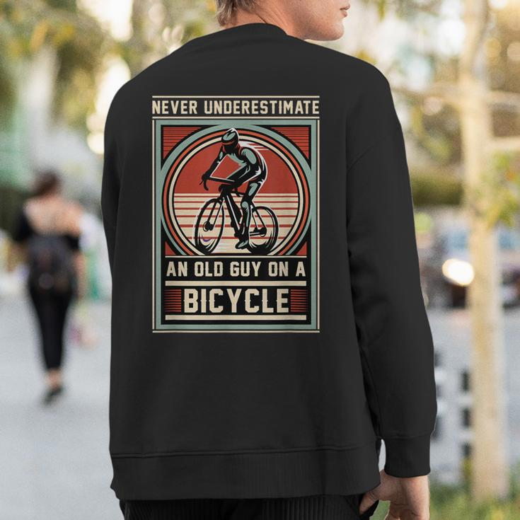 Never Underestimate An Old Guy On A Bicycle Vintage Style Sweatshirt Back Print
