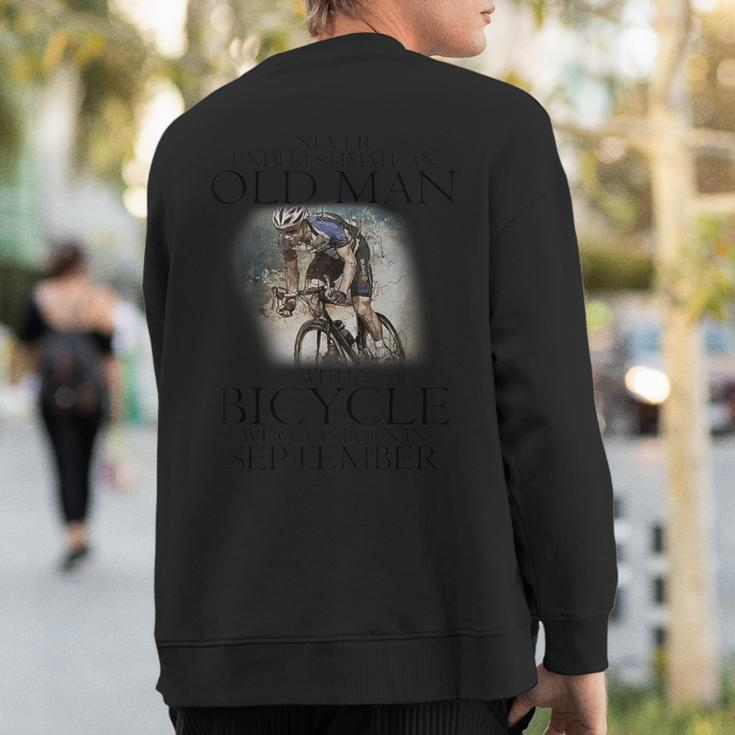 Never Underestimate An Old Man With A Bicycle September Sweatshirt Back Print