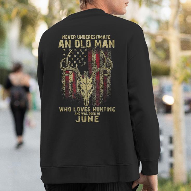 Never Underestimate An Old Man Loves Hunting Born In June Sweatshirt Back Print