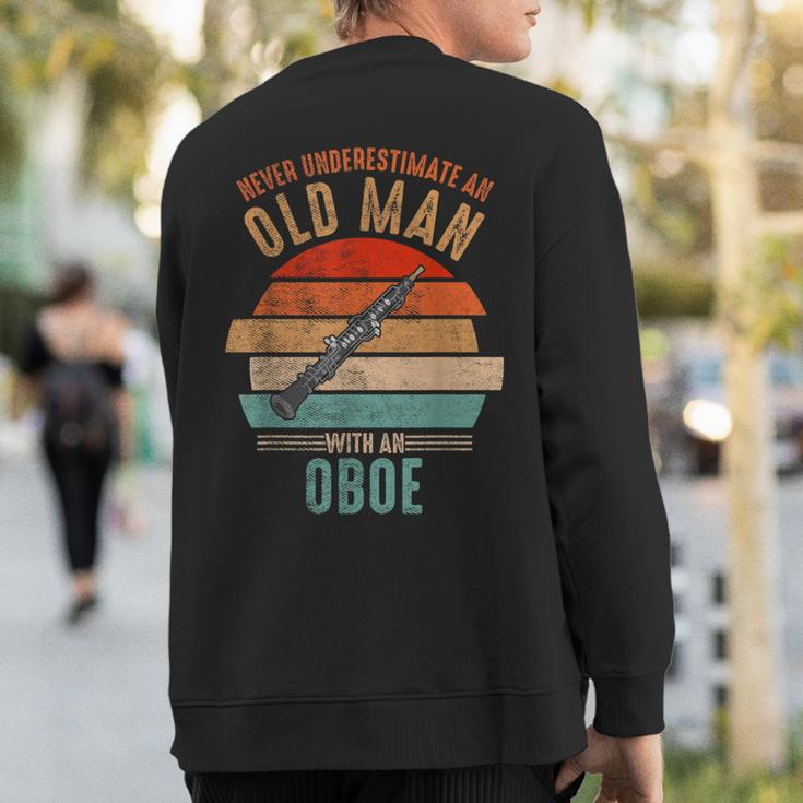 Vintage Never Underestimate An Old Man With An Oboe Sweatshirt Back Print