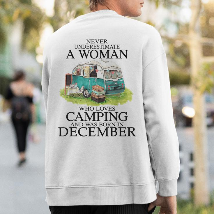 Never Underestimate Who Loves Camping December Sweatshirt Back Print