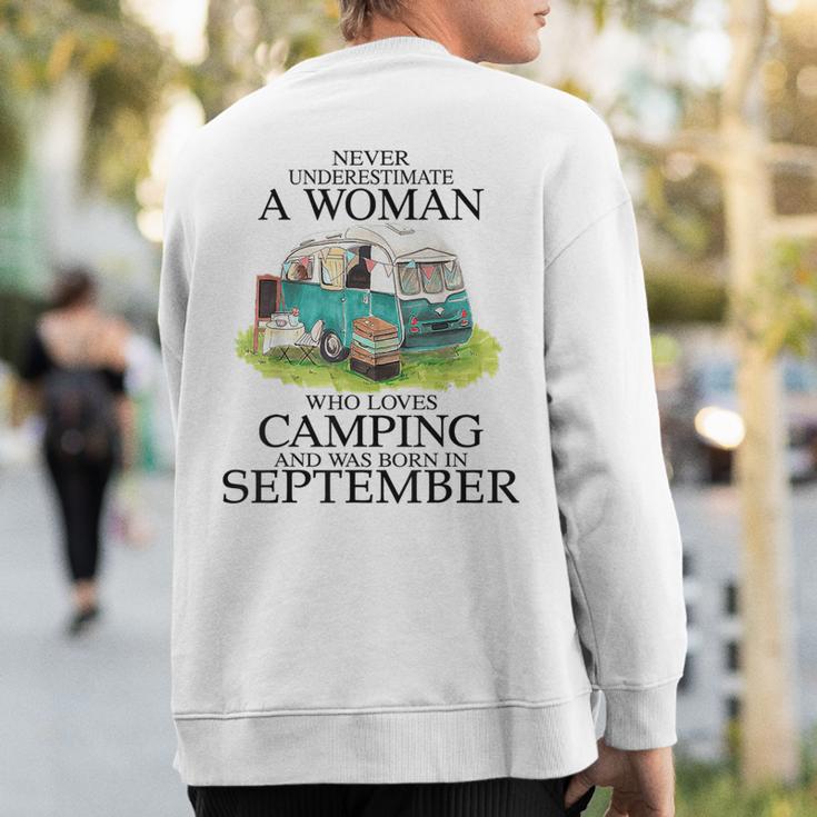 Never Underestimate Who Loves Camping September Sweatshirt Back Print