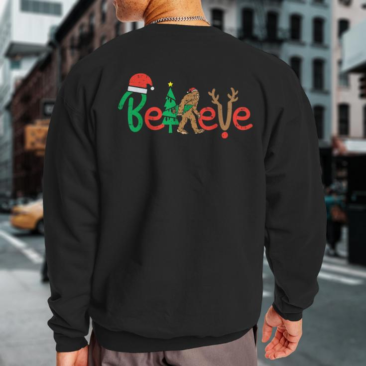 Believe Bigfoot Sasquatch Santa Reindeer Christmas Tree Sweatshirt Back Print