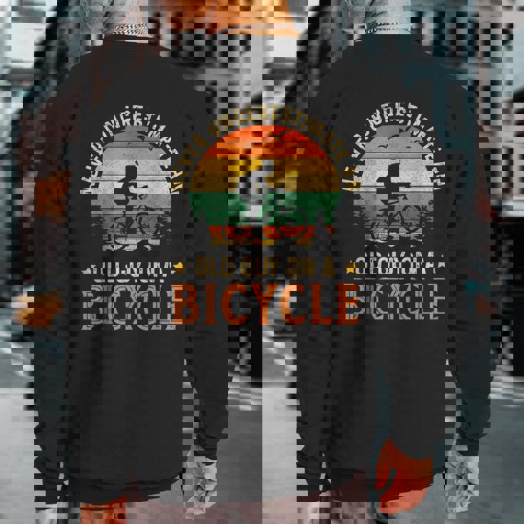 Bike Vintage Never Underestimate An Old Guy On A Bicycle Sweatshirt Back Print