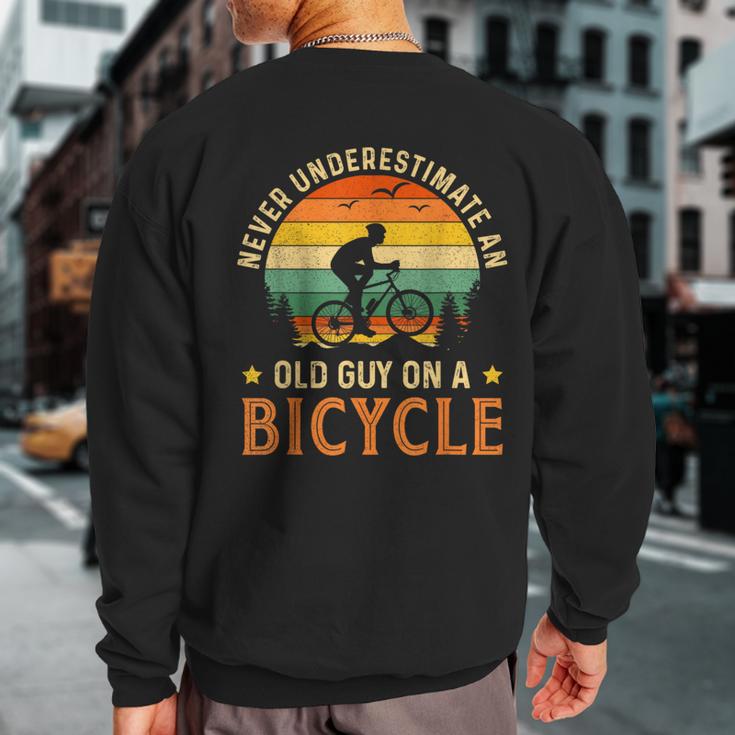 Bike Vintage Never Underestimate An Old Guy On A Bicycle Sweatshirt Back Print