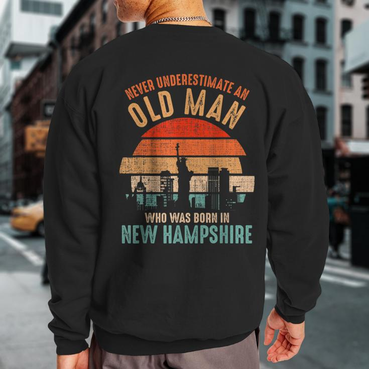 Mb Never Underestimate An Old Man Born In New Hampshire Sweatshirt Back Print