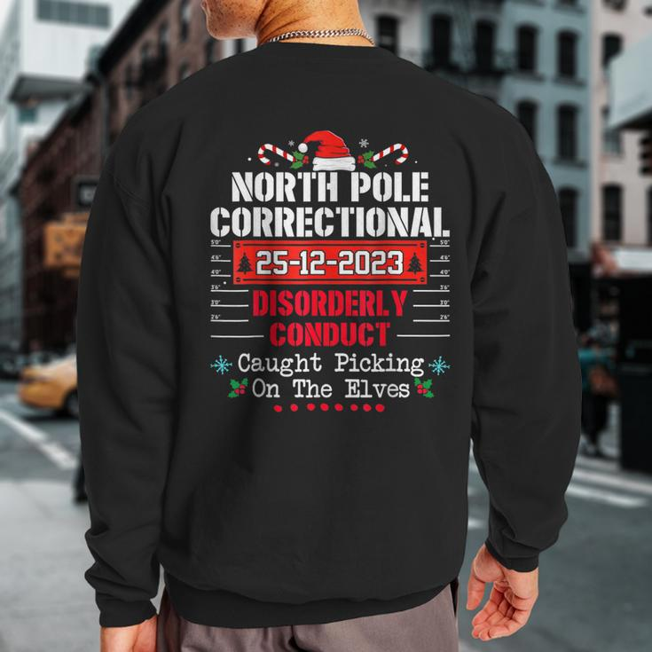 North Pole Correctional Disorderly Conduct Caught Elves Xmas Sweatshirt Back Print