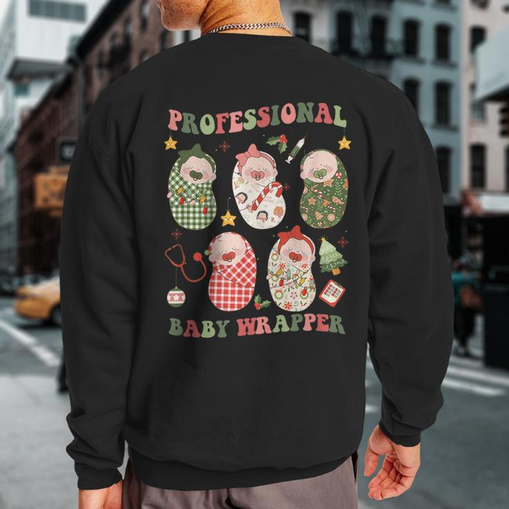 Professional Baby Wrapper Labor And Delivery Christmas Nurse Sweatshirt Back Print