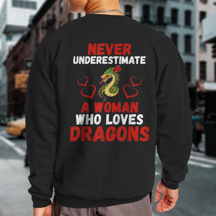 Never Underestimate Love Dragons Graphic Sweatshirt Back Print