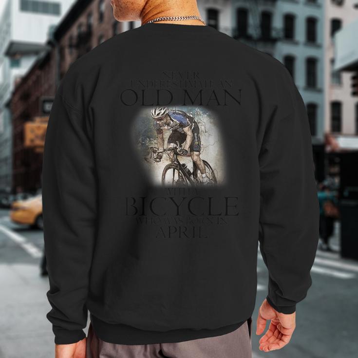 Never Underestimate An Old Man With A Bicycle Born In April Sweatshirt Back Print