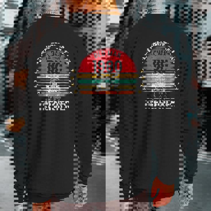 Never Underestimate An Old Man Firefighter 1980 Birthday Sweatshirt Back Print