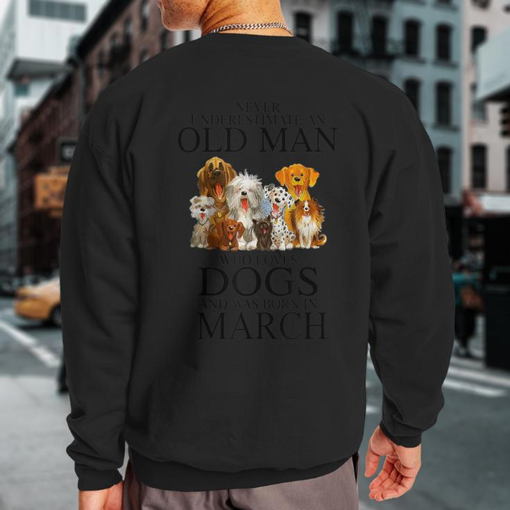 Never Underestimate An Old Man Who Loves Dogs Born In March Sweatshirt Back Print