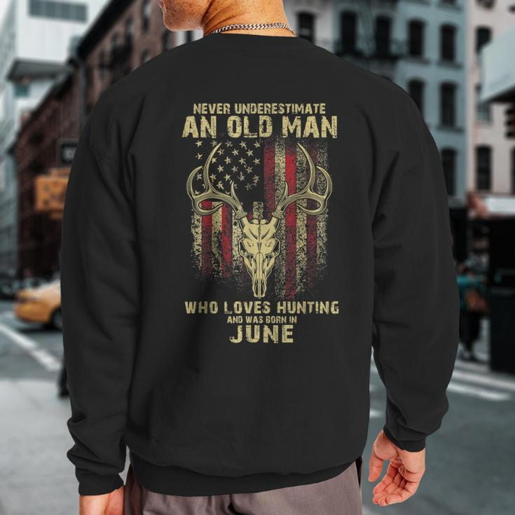Never Underestimate An Old Man Loves Hunting Born In June Sweatshirt Back Print