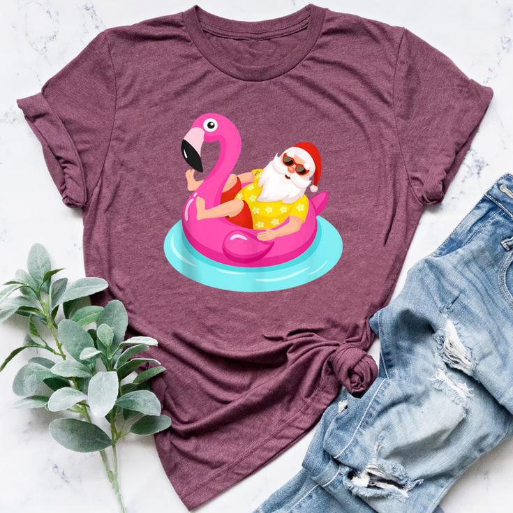 Christmas In July Santa Relaxing On A Flamingo Float Bella Canvas T-shirt