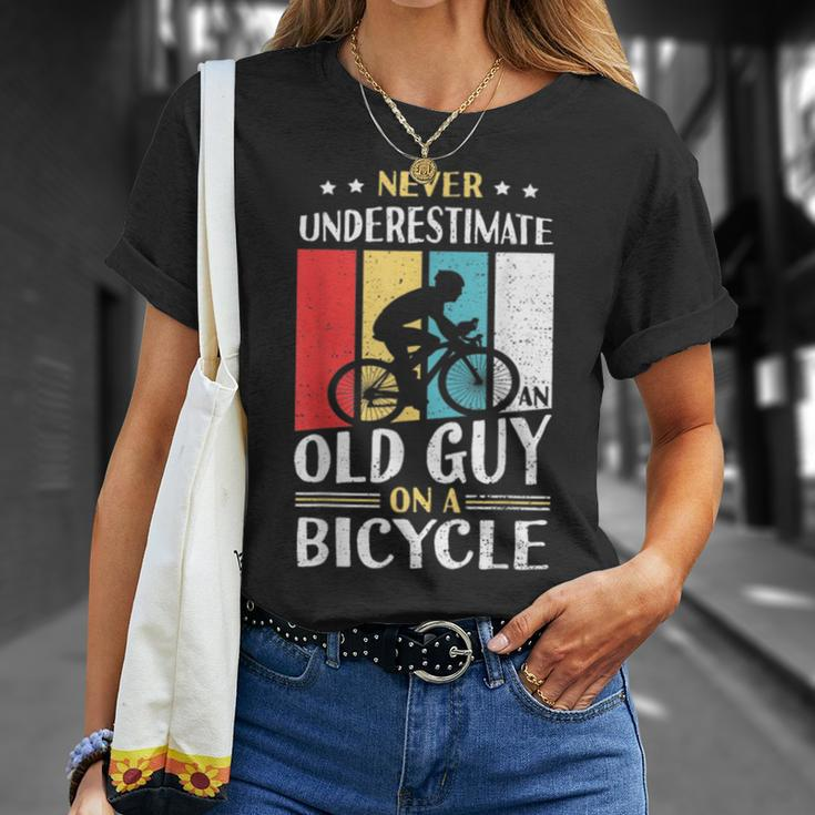 Never Underestimate An Old Guy On A Bicycle Bike Cyclist Unisex T-Shirt Gifts for Her