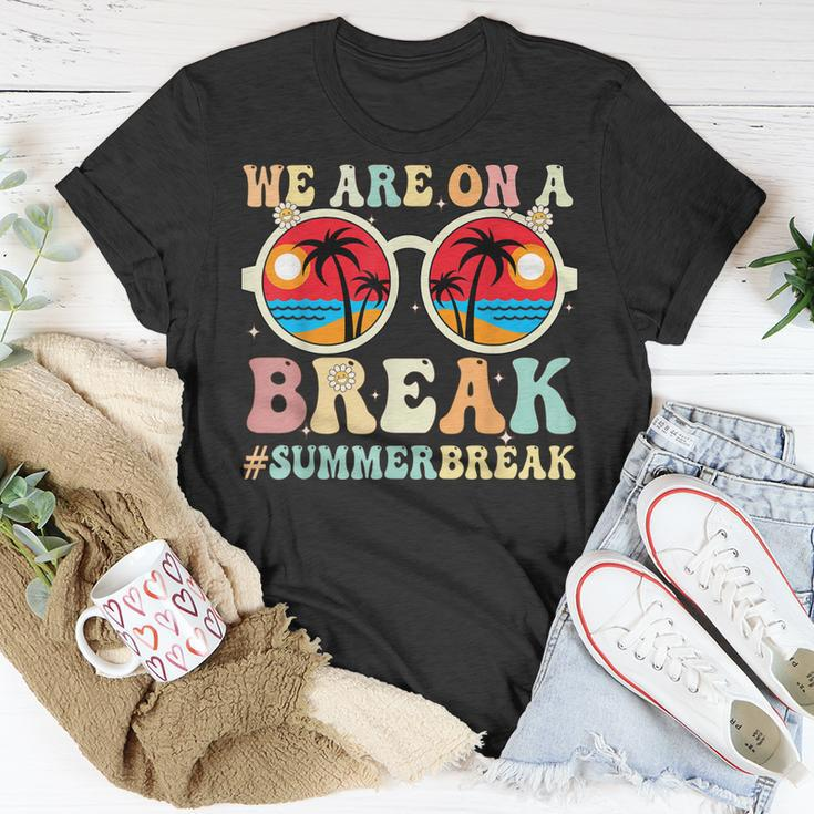 We Are On A Break Teacher Retro Groovy Summer Break Teachers Unisex T-Shirt Funny Gifts