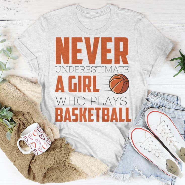 Never Underestimate A Girl Who Plays Basketball Funny Sports Basketball Funny Gifts Unisex T-Shirt Unique Gifts