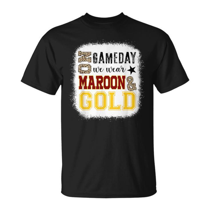 maroon and gold shirt