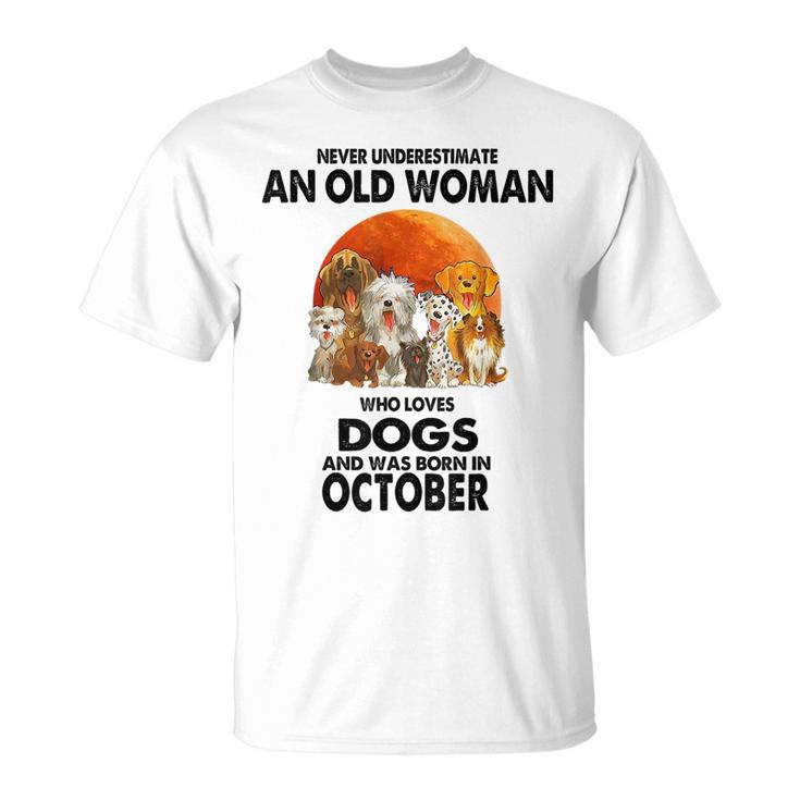 Never Underestimate An Old Woman Who Loves Dogs Born October Old Woman Funny Gifts Unisex T-Shirt