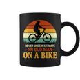 Never Underestimate Funny Quote An Old Man On A Bicycle Retr Coffee Mug