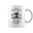 Never Underestimate Old Lady Loves Dogs Born In May Coffee Mug