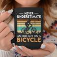 Never Underestimate An Old Guy On A Bicycle Cycling Vintage Coffee Mug Funny Gifts