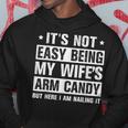 Its Not Easy Being My Wifes Arm Candy Here I Am Nailing It Hoodie Funny Gifts