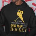 Never Underestimate An Old Man Who Play Hockey Old Man Funny Gifts Hoodie Unique Gifts