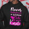 Never Underestimate And Old Woman Who Knows Karate Martial Old Woman Funny Gifts Hoodie Unique Gifts