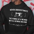 Never Underestimate The Power Of A Woman W A Sewing Machine Sewing Funny Gifts Hoodie Unique Gifts