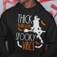 Thick Thighs Spooky Vibes Pretty Eyes Witch Halloween Party Hoodie Unique Gifts