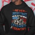 Never Underestimate An Old Man Veterans Day Army Veteran Hoodie Unique Gifts