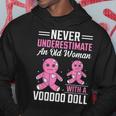Never Underestimate An Old Woman With A Voodoo Doll Old Woman Hoodie Unique Gifts
