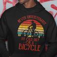 Vintage Never Underestimate An Old Guy On A Bicycle Biker Gift For Mens Hoodie Unique Gifts