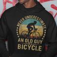 Vintage Never Underestimate An Old Guys On A Bicycle Cycling Cycling Funny Gifts Hoodie Unique Gifts