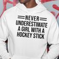 Never Underestimate A Girl With A Hockey Stick Hockey Girl Hockey Funny Gifts Hoodie Unique Gifts