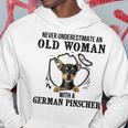 Never Underestimate An Old Woman With A German Pinscher Old Woman Funny Gifts Hoodie Unique Gifts