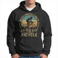 Vintage Never Underestimate An Old Guys On A Bicycle Cycling Cycling Funny Gifts Hoodie