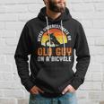 Never Underestimate An Old Guy On A Bicycle Funny Riders Dad Hoodie Gifts for Him