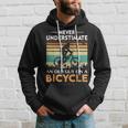 Never Underestimate An Old Guy On A Bicycle Cycling Vintage Hoodie Gifts for Him