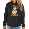Trick Or Teach Groovy Halloween Retro Floral Ghost Teacher Women Hoodie