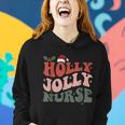 Holly N Jolly Nurse Santa Hat Groovy Christmas 2023 Women Hoodie Gifts for Her