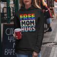 Free Mom Hugs Groovy Rainbow Heart Lgbt Flag Pride Month Women Hoodie Unique Gifts